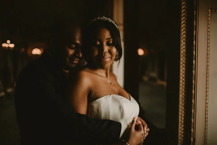 indian and african bride share intimate moment at syon park
