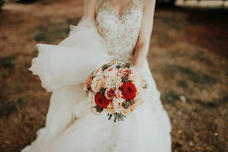 vintage bride with bouquet at quex park wedding