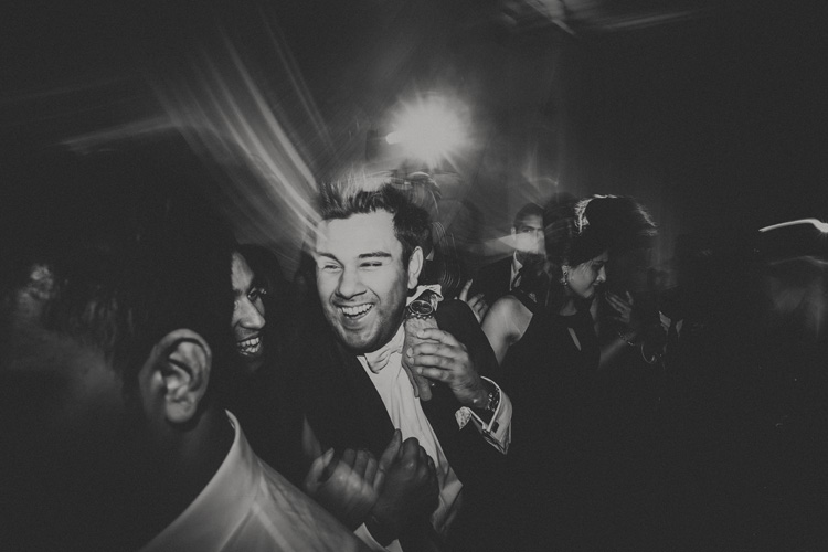 indian groom parting at hindu wedding reception