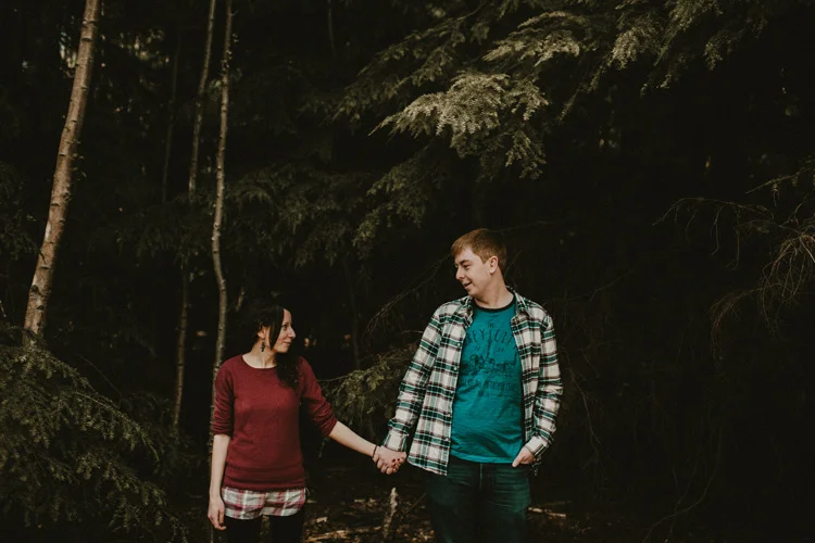 couple hold hands in birchington engagement