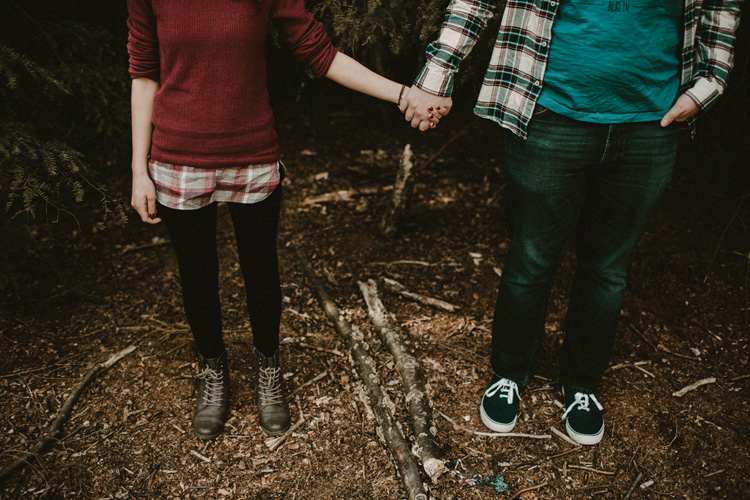couple holding hands in birchington engagement