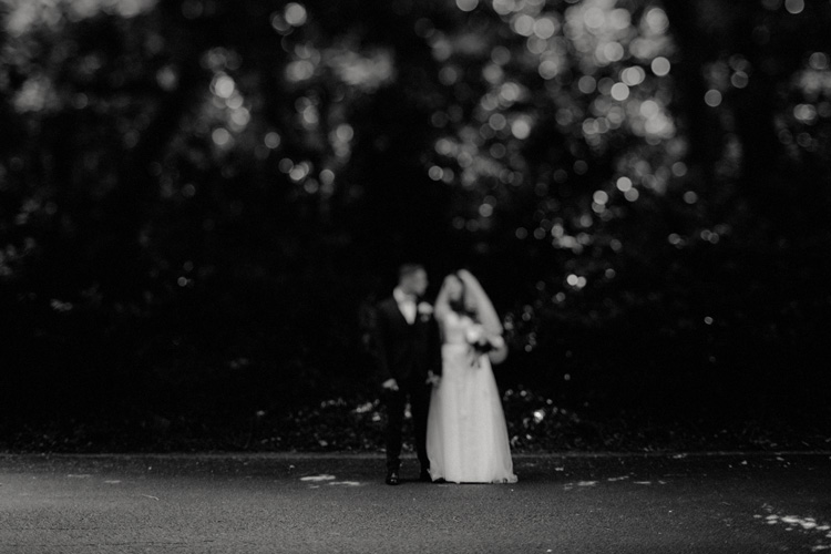 bride and groom hold hands after traditional wedding ceremony