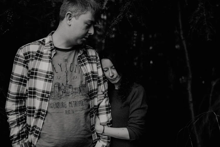 couple hold each other in intimate birchington engagement