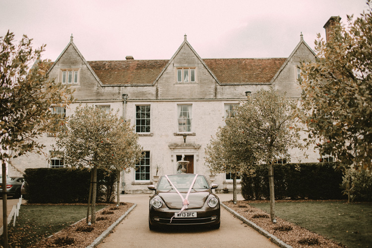 bridal car parked outside froyle park