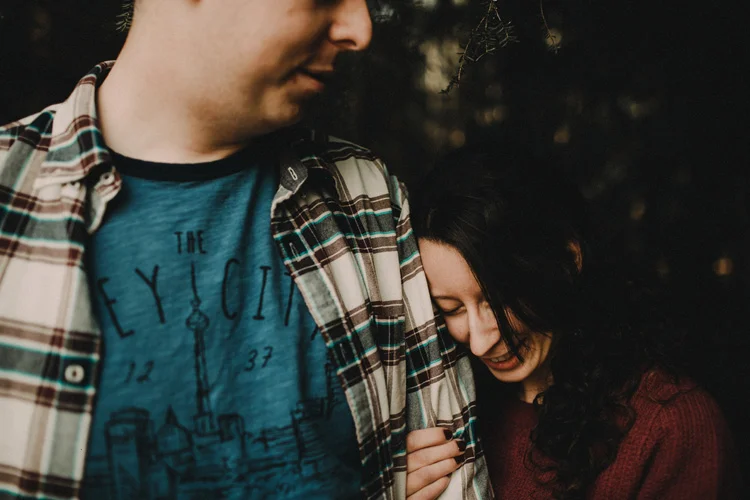 couple sharing intimate moment in birchington engagement