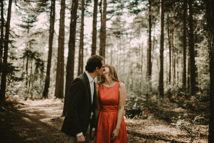 french and russian couple kiss in london engagement