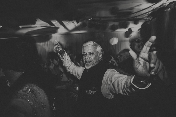 uncle dancing at hindu wedding reception in southampton wedding