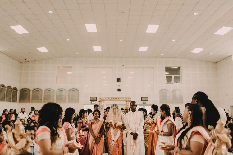 brides precessional to hindu ceremony in london wedding