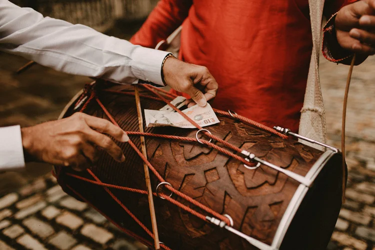 wedding guest puts money on dhol in southampton wedding