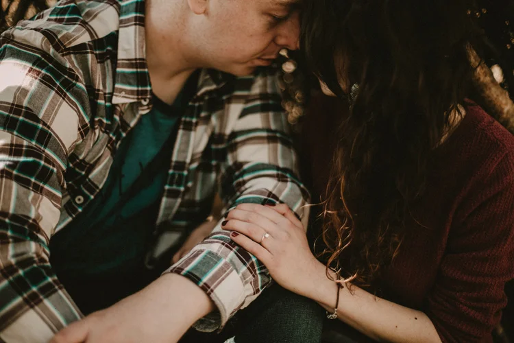 couple touch foreheads in birchington engagement session