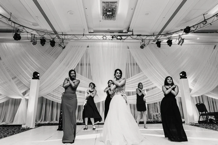bride performs bollywood dance for husband during southampton wedding reception