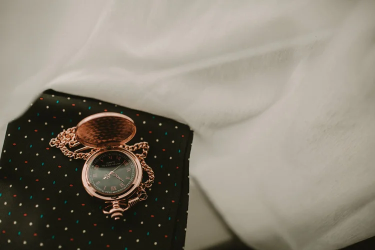 grooms pocket watch at froyle park wedding