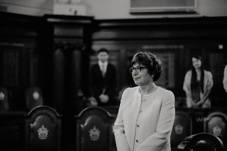 grooms mother stands crying during london islington wedding