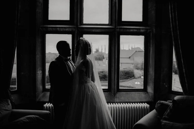 bride and groom share intimate moment in froyle park wedding