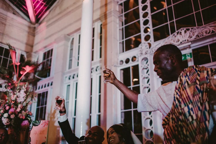 brides father offers a toast during wedding reception at syon parks great conservatory