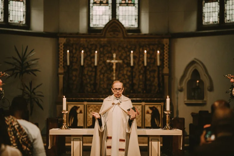 priest during ceremony in london wedding