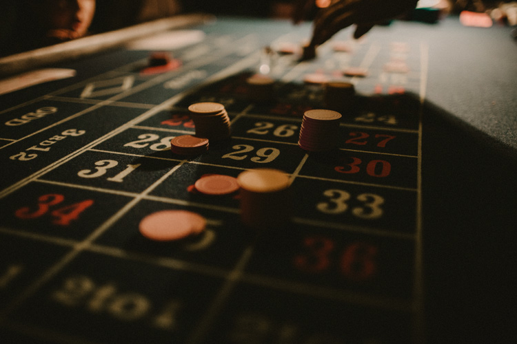 poker chips at wedding reception in syon park's great conservatory