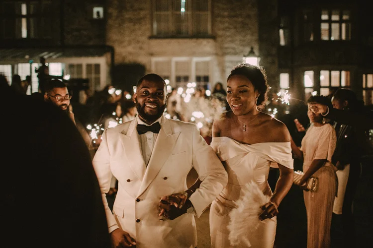 bride and groom have sparkler exit at froyle park wedding