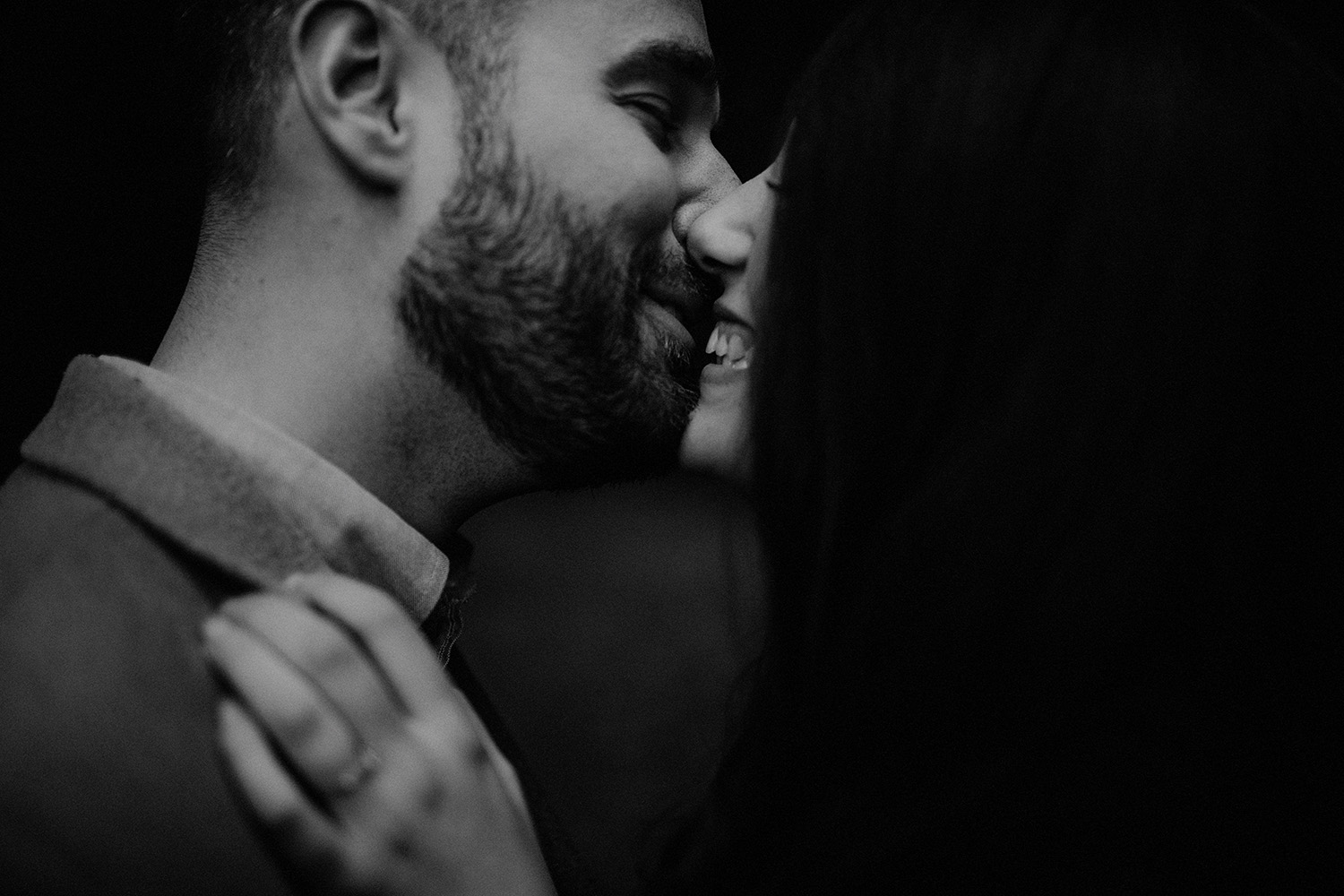 Cute couple kiss in London engagement session