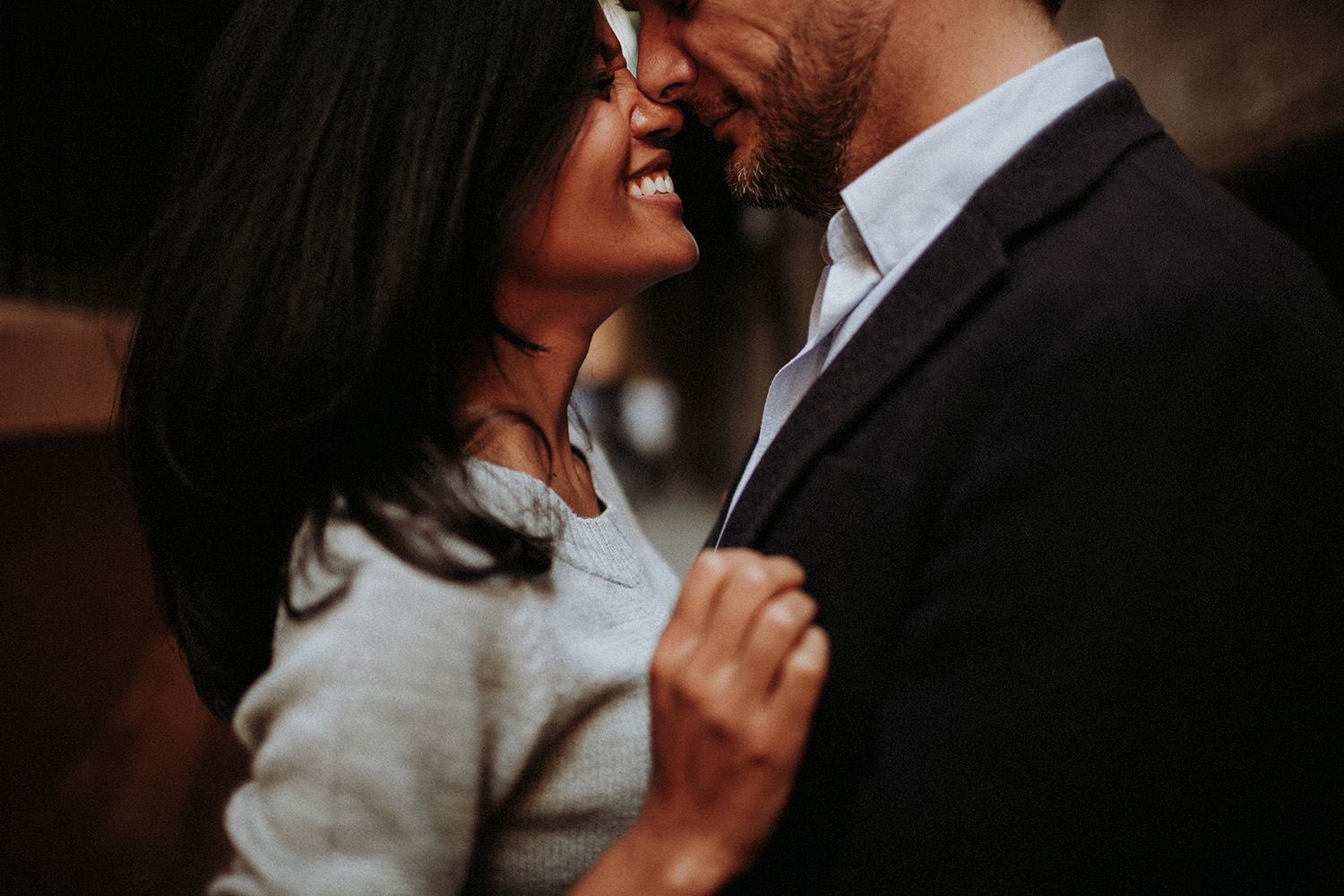 couple share playful moment during Barcelona engagement