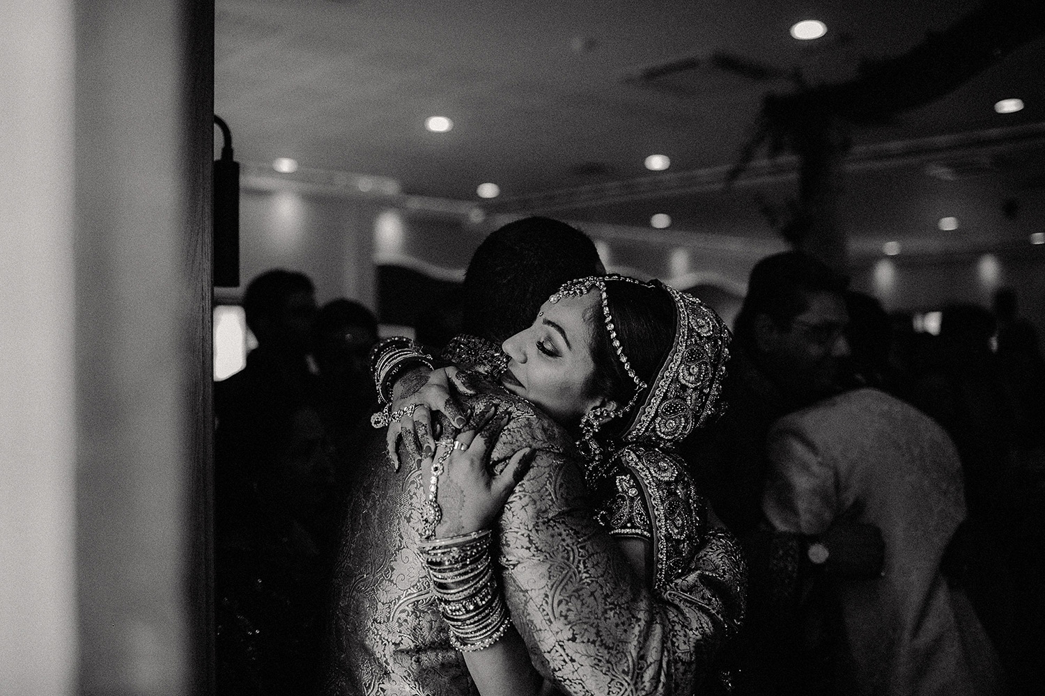 Copy of Copy of Copy of Copy of Copy of Copy of Copy of Copy of asian bride hugs brother after London hindu ceremony 