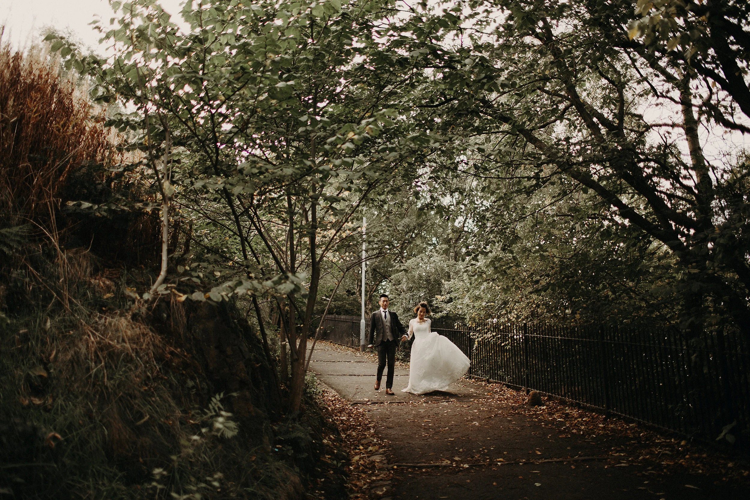 chinese bride and groom walk to elopement location