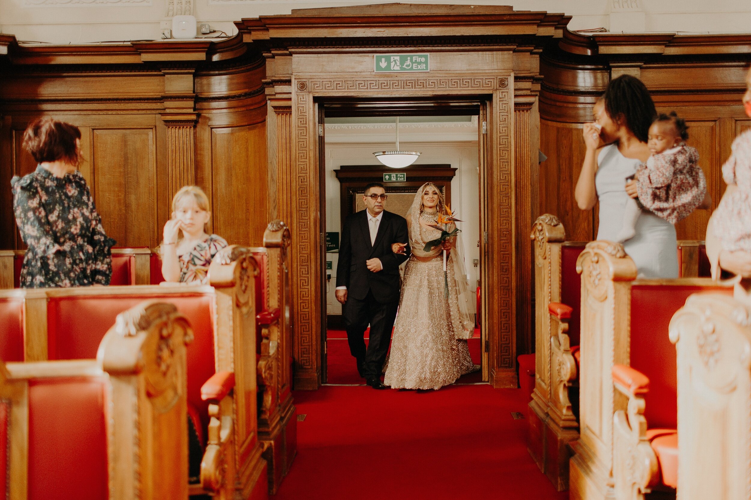 060_LondonAsianWeddingPhotographer0073_green_the_wedding_on_crypt.jpg