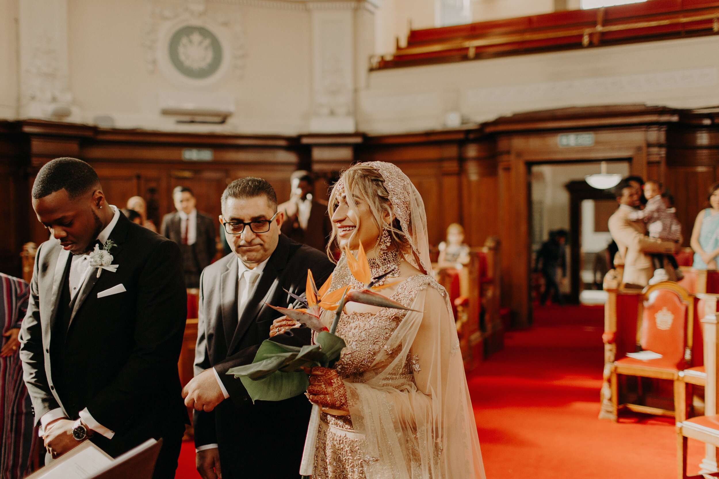 064_LondonAsianWeddingPhotographer0078_green_the_wedding_on_crypt.jpg