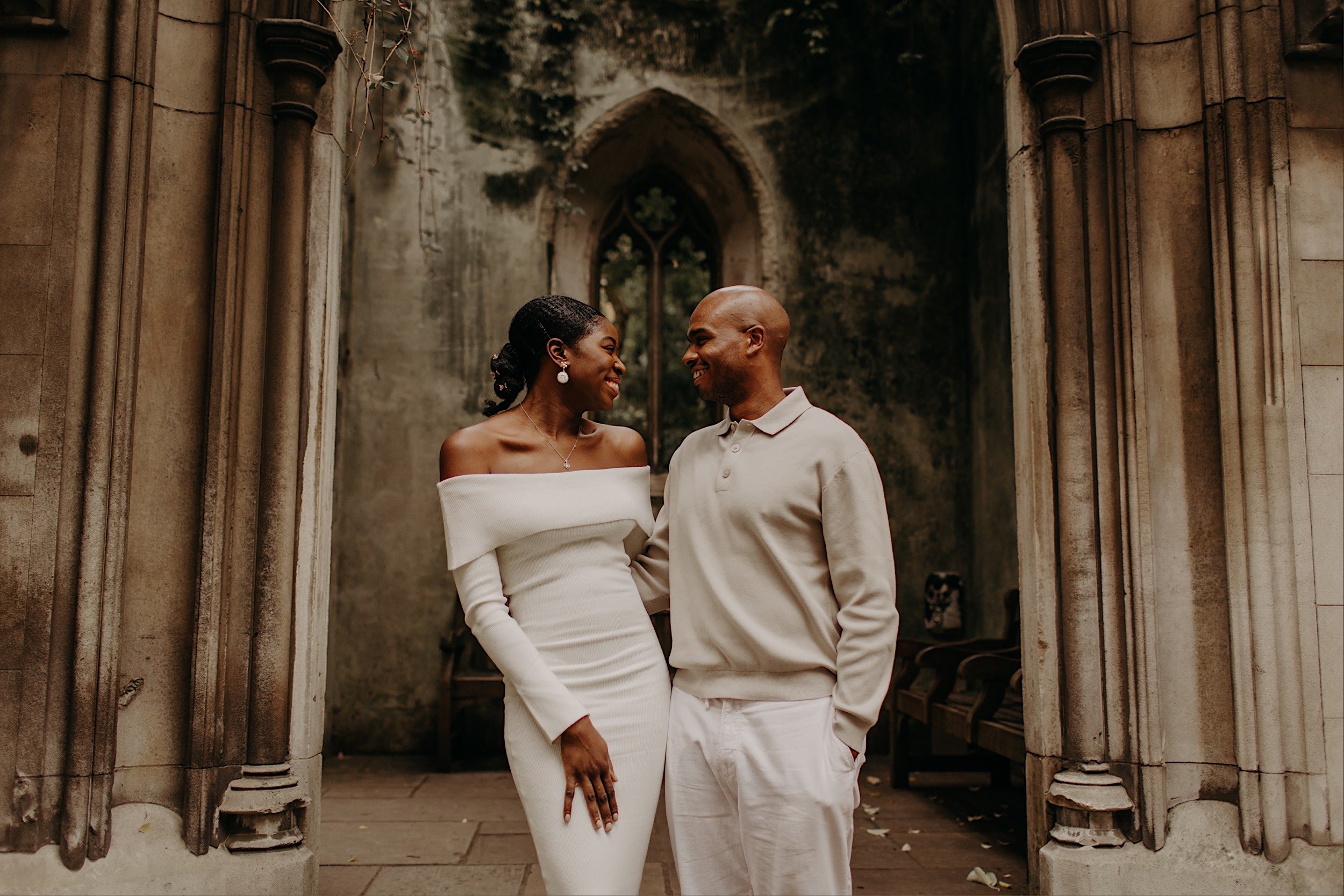 16_St-Dunstans-in-the-east-pre-wedding-shoot0021_Gorgeous black couple in love share a joke in st dunstan in the east.jpg