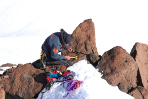 Ben reaches the “lichen” rock. He gathers samples for Olivier who confirmed that we had indeed found the highest growing lichen in the arctic!