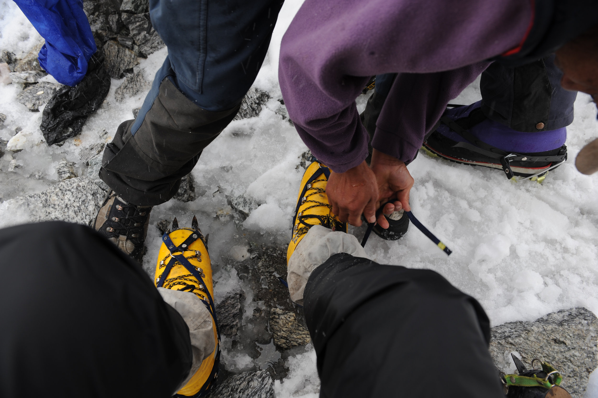 Fitting crampons.