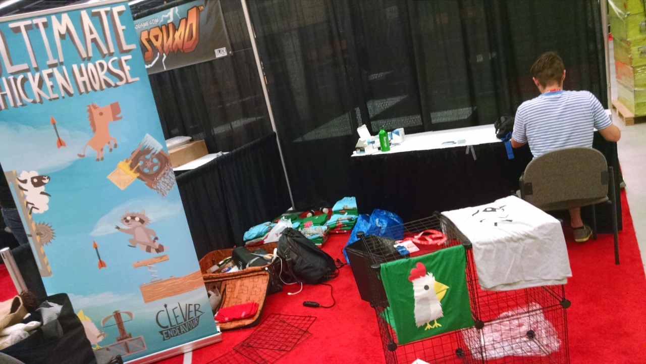 Setting up our booth, not quite as large as some others...