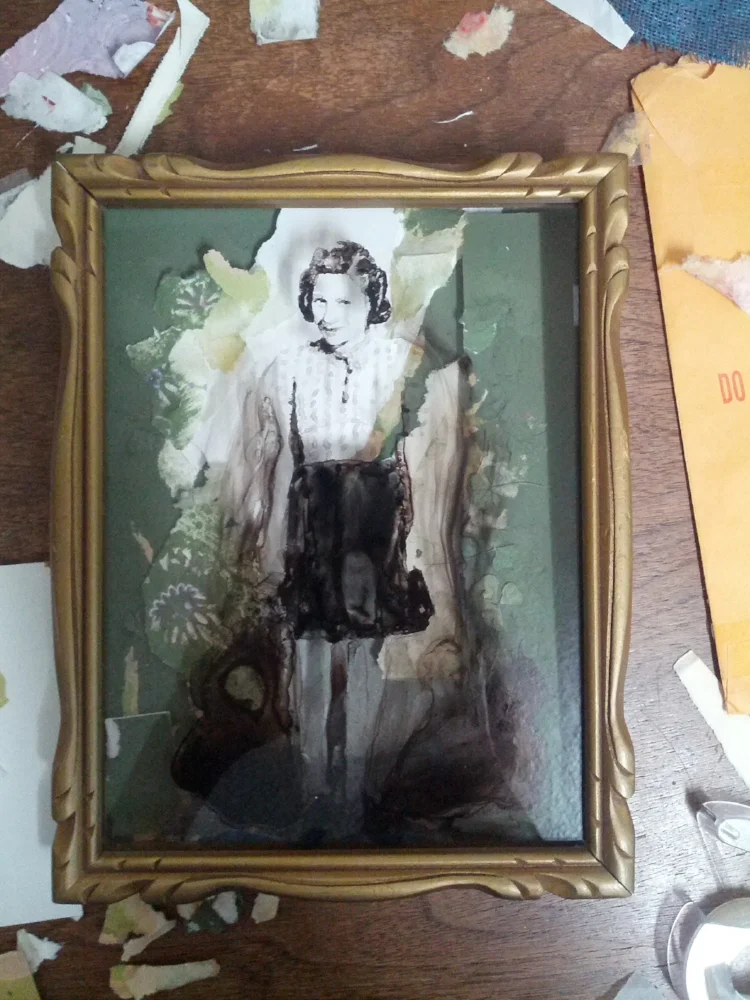 Assembling a collage that works with the image. (The big chunk of green mat board on the right side didn't make it into the final piece, and the clovers worked better in the opposite corner...)