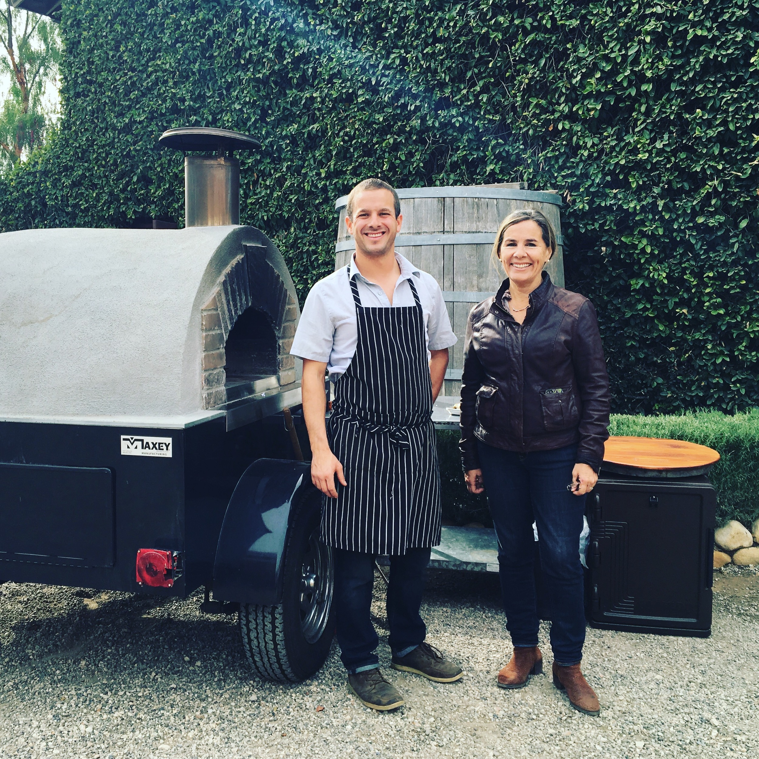                    Tomás and Malena with our mobile Wood-Fired oven at Brander Vineyard in Los Olivos.&nbsp; 