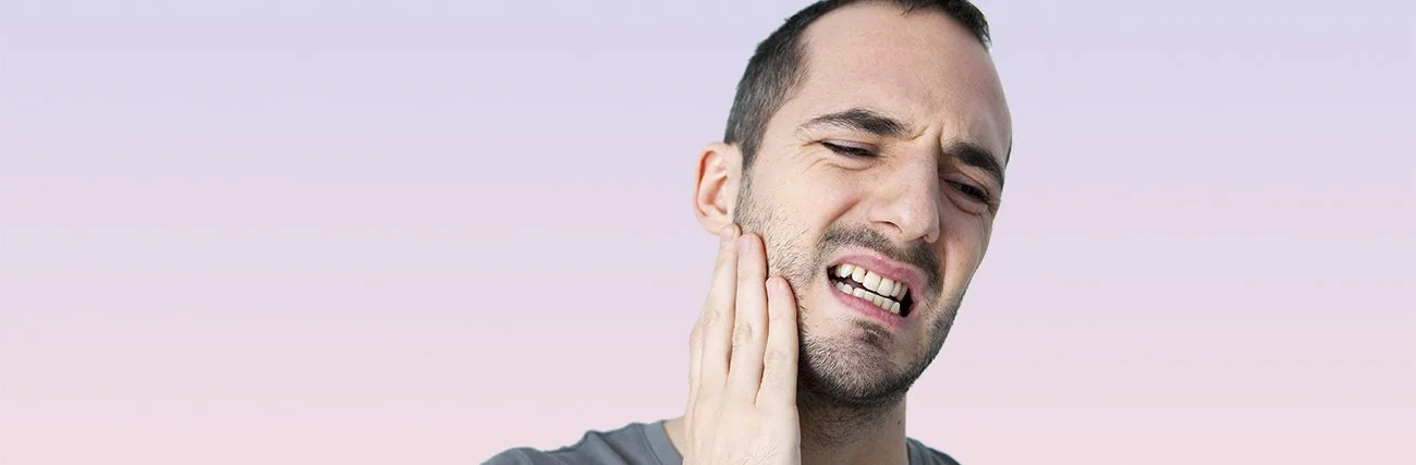 Patient experiencing jaw pain