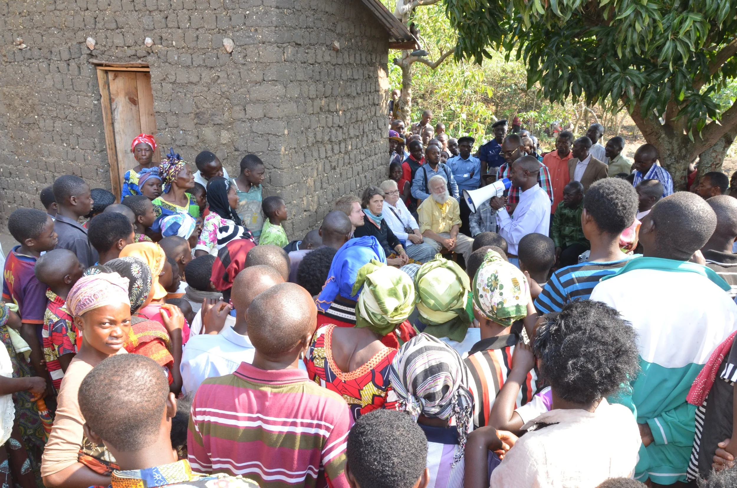 Our delegation speaking with people of Idjwi Island during our visit