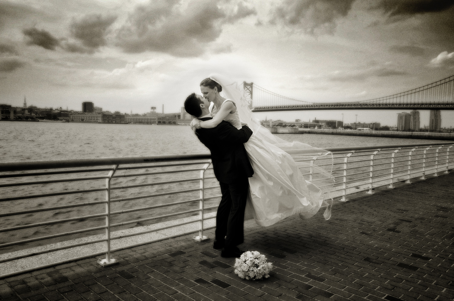 bride and groom at Camden, New Jersey riverfront / Meyer Photography