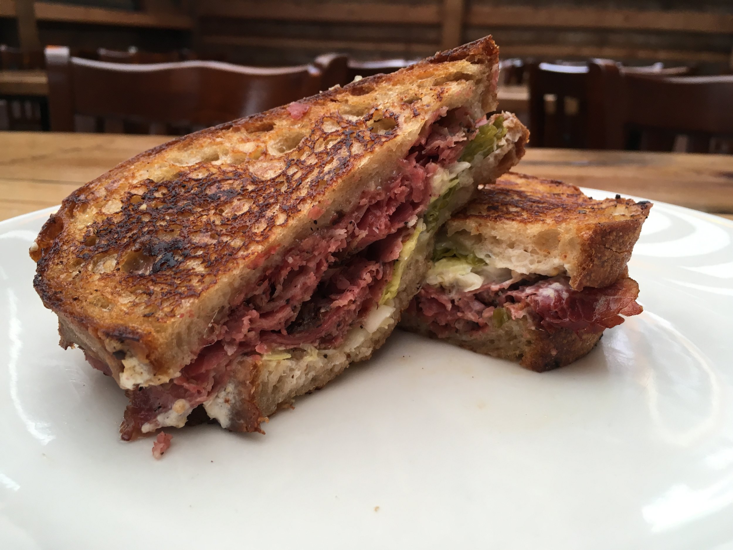 reuben and a pint $12 fried cheese curds $3 drink special: dirty camping mule $6