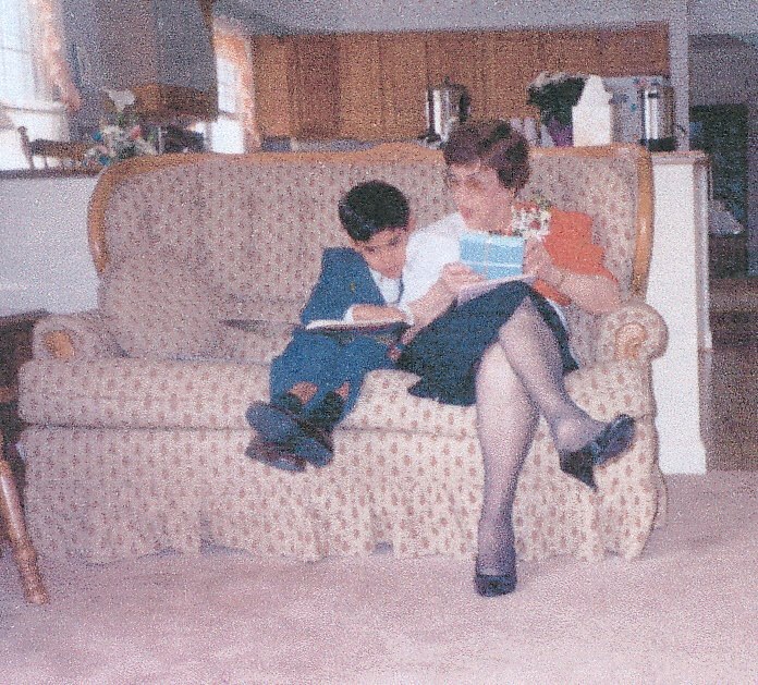 Reading with Nana on her 80th birthday.
