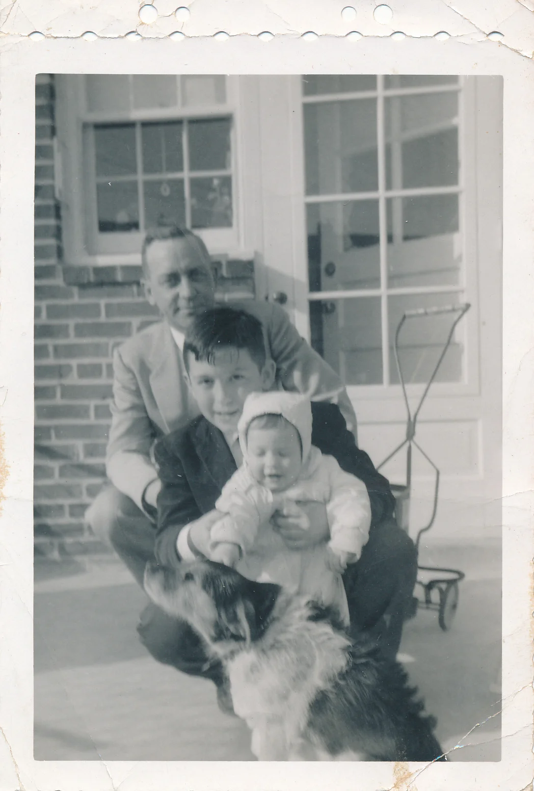 My Grandfather and Dad with Aunt Betty as a baby.