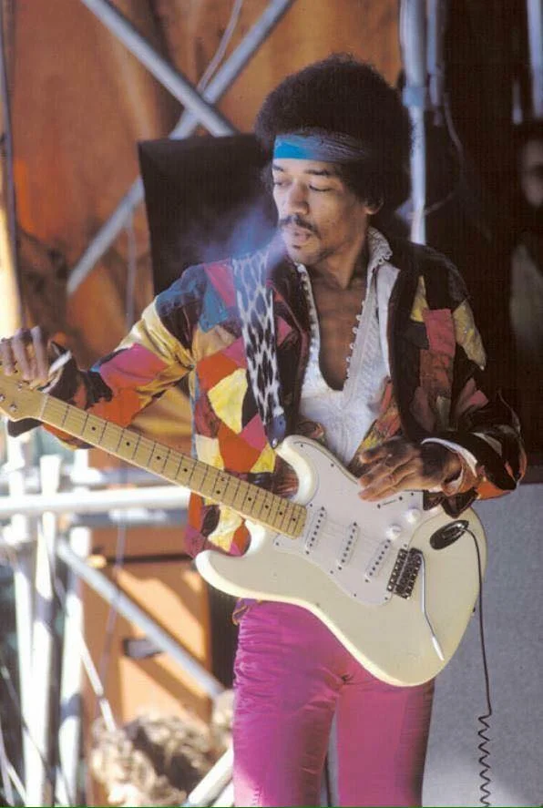 Jimi Headstock smoke.jpg