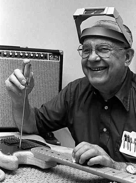 Leo Fender at his work bench in 1977