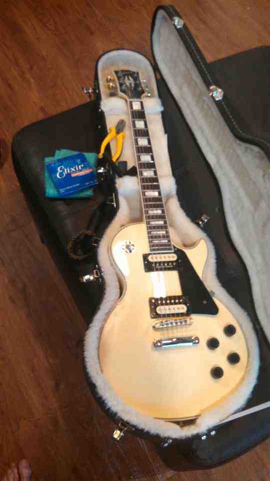 My very first Gibson 2011 Classic Custom! Had been wanting a Les Paul since I was a kid! One of many dreams come true made possible by my wife loaded with Seymour Duncan pearly gates named her Pearle courtesy of Jeff Crabbs.jpg