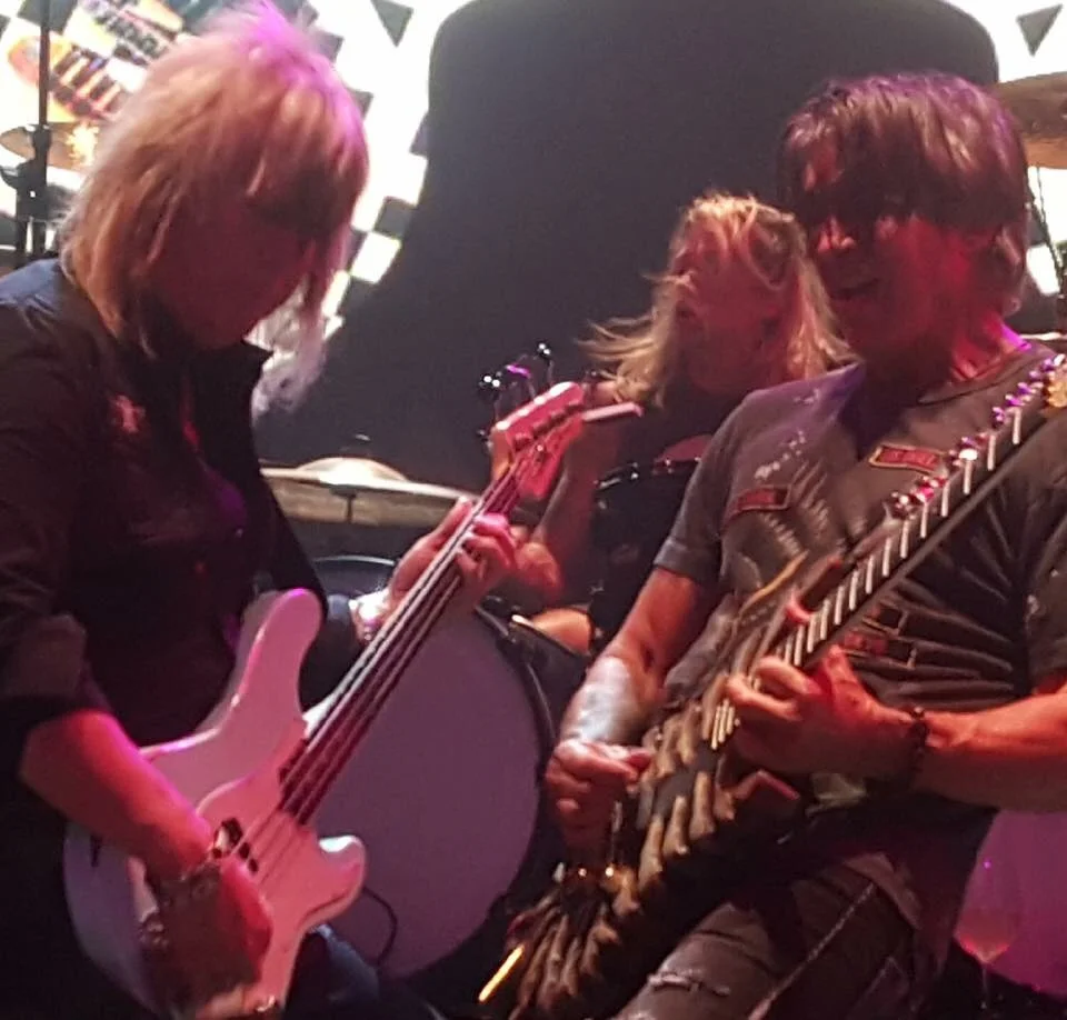 Paul drennan on stage with george lynch