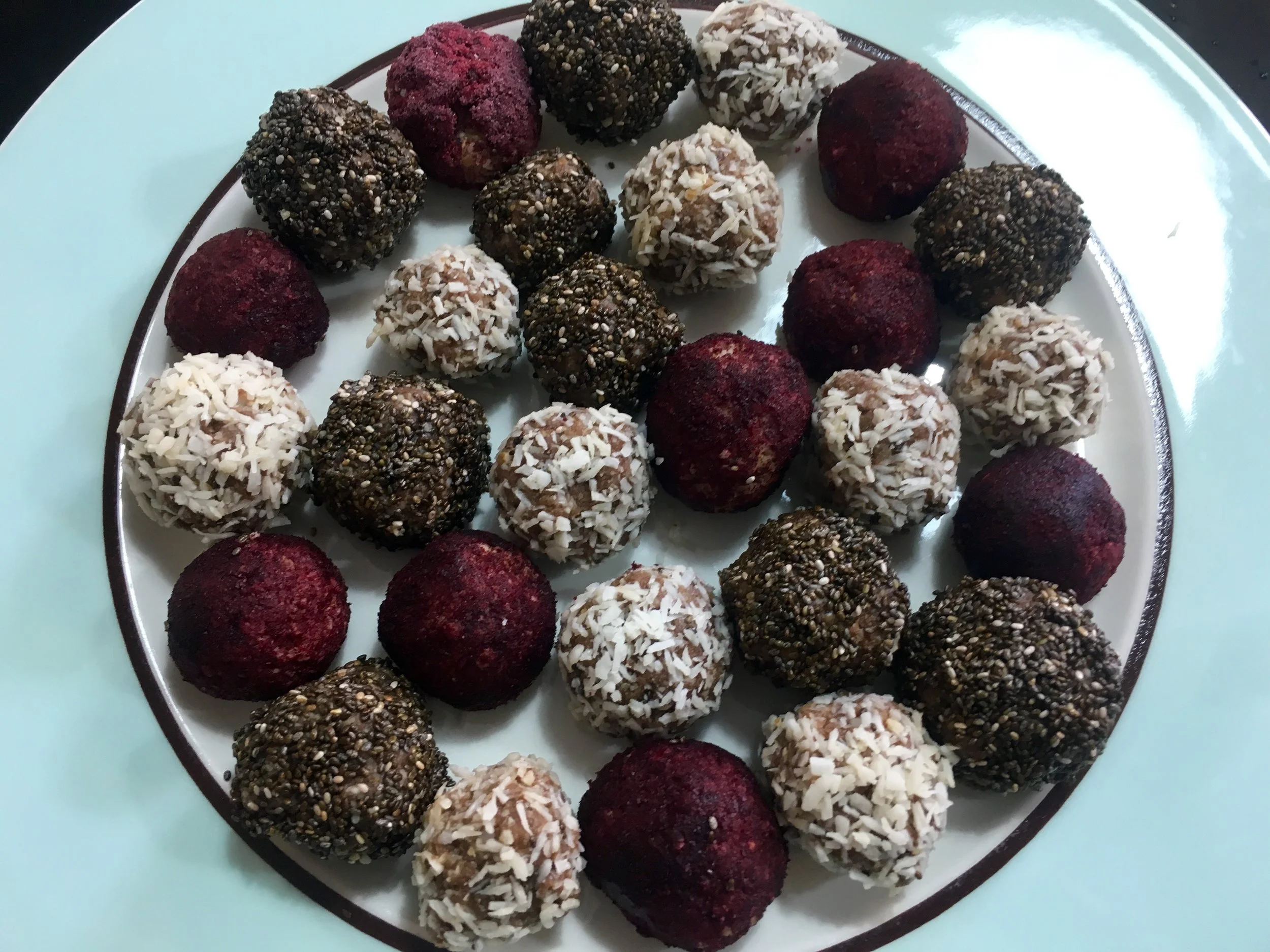 Get creative - these are coated with raspberry superfood powder, coconut and chia seeds...