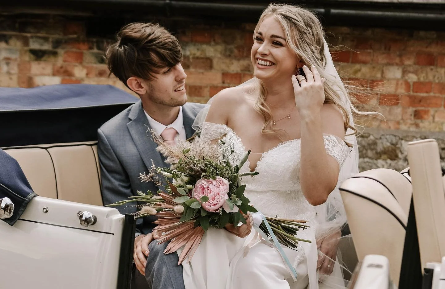 bride and groom vintage wedding car in kent