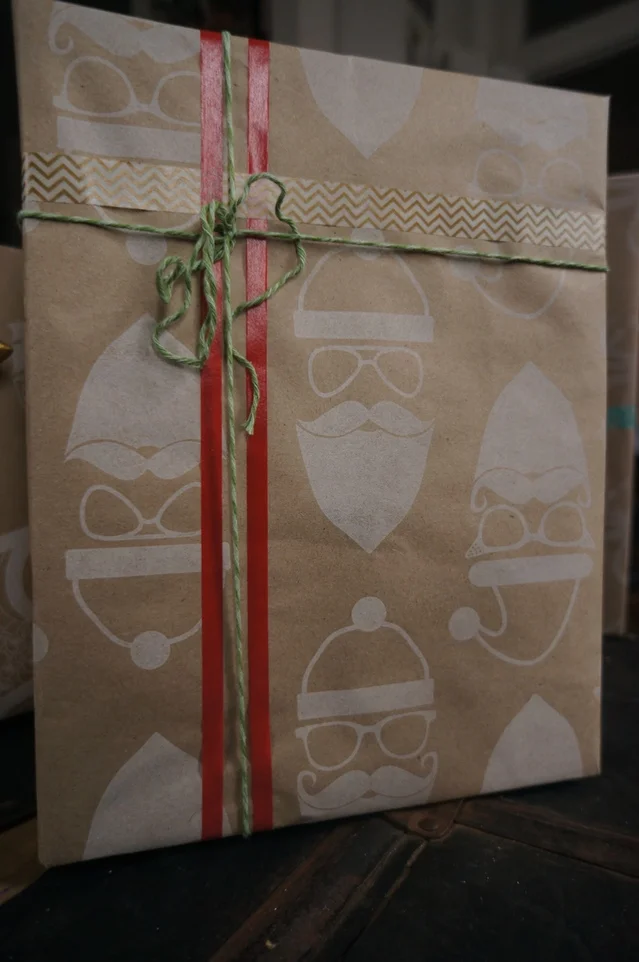 Paper Forward | Santa's vacation print wrapping leterpressed on 100% recycled paper