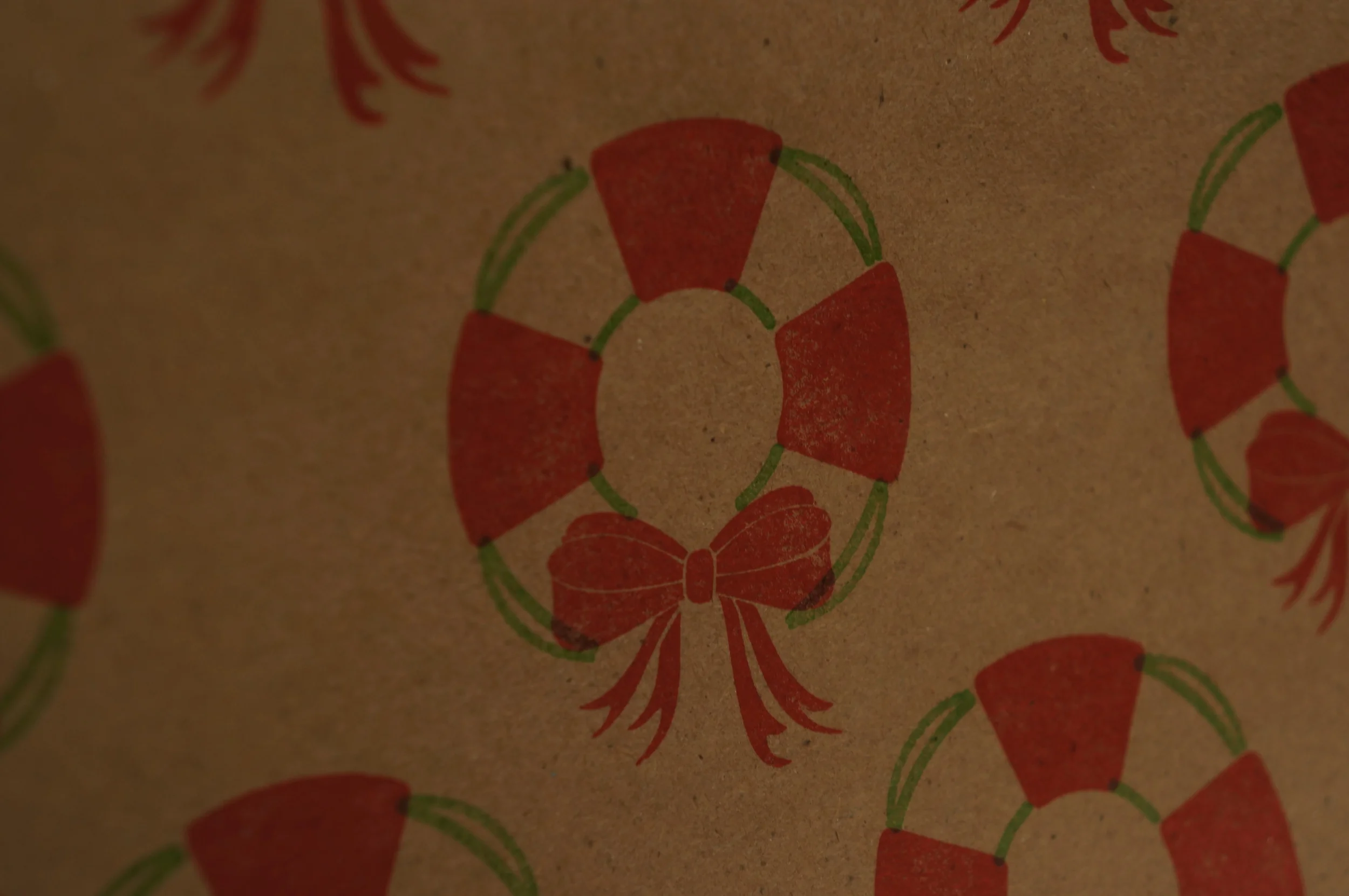 Paper Forward | Closeup: Wreath Preservers print wrapping leterpressed on 100% recycled paper
