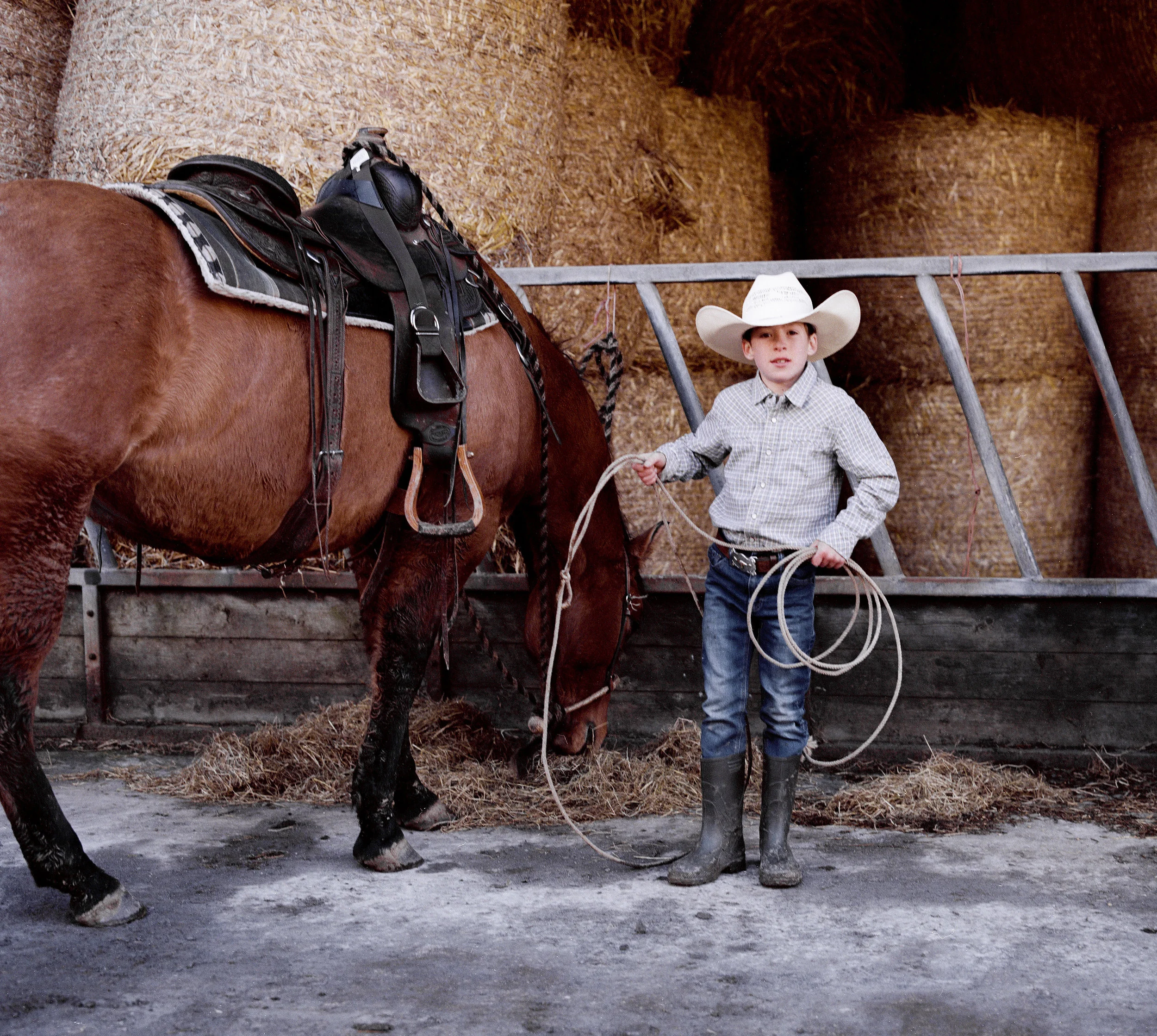 Rueben Linscott practicing his Lassoing on his grandfathers ranch in Devon. Rueben has been taught how to ride and lasso by his grandfather Brian Rowden, who runs the western rodeo events in Devon. He currently prefers lassoing as he believes it is “the hardest part about western riding”.