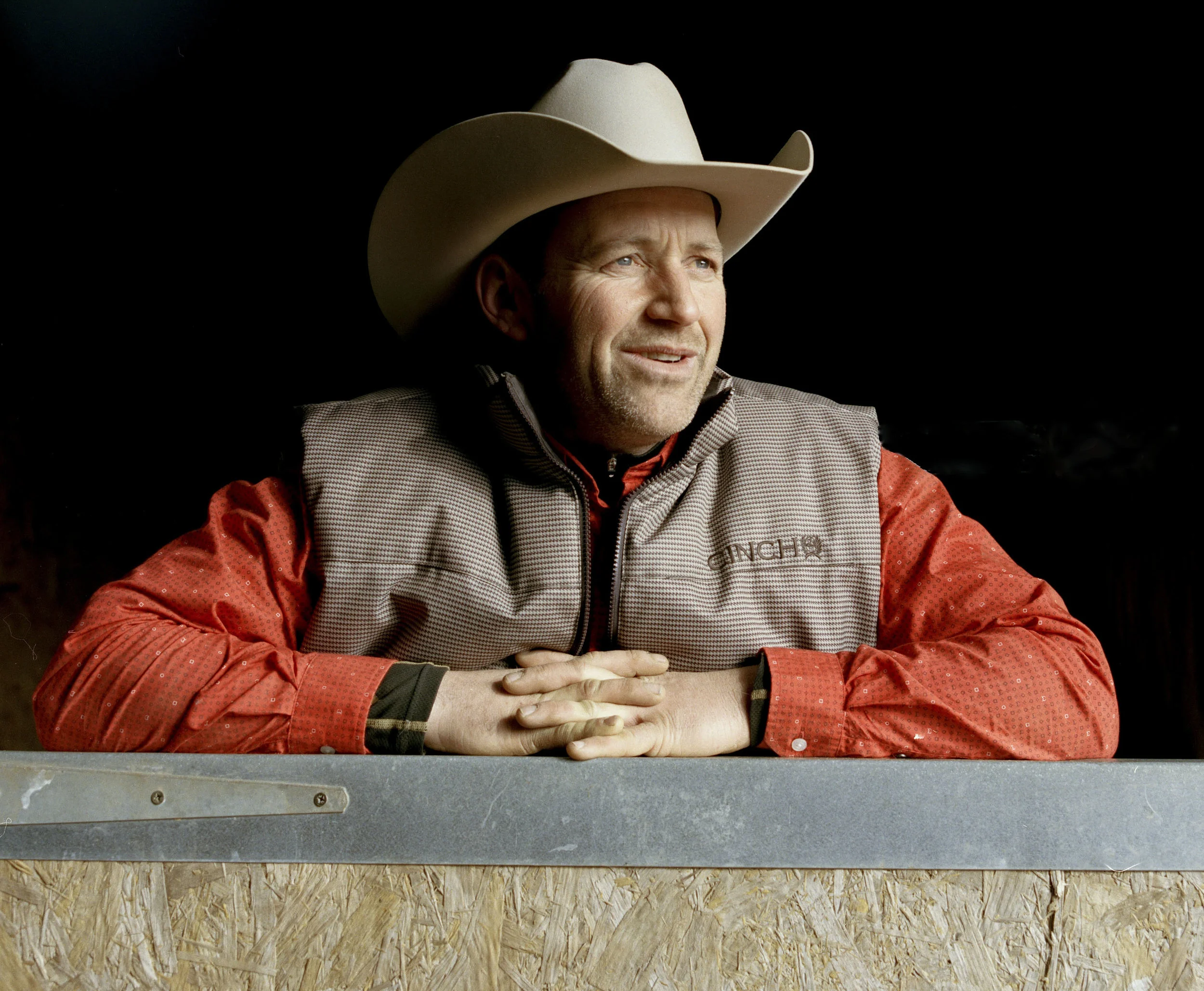 Joe Wolter leaning on the gate to his stables, while taking a rest from tending his horse at The Crescent Arena. Joe competes in rodeo events around Europe during the summer, as there is more prize money to be won abroad. During the winter he trains at the Crescent Arena.